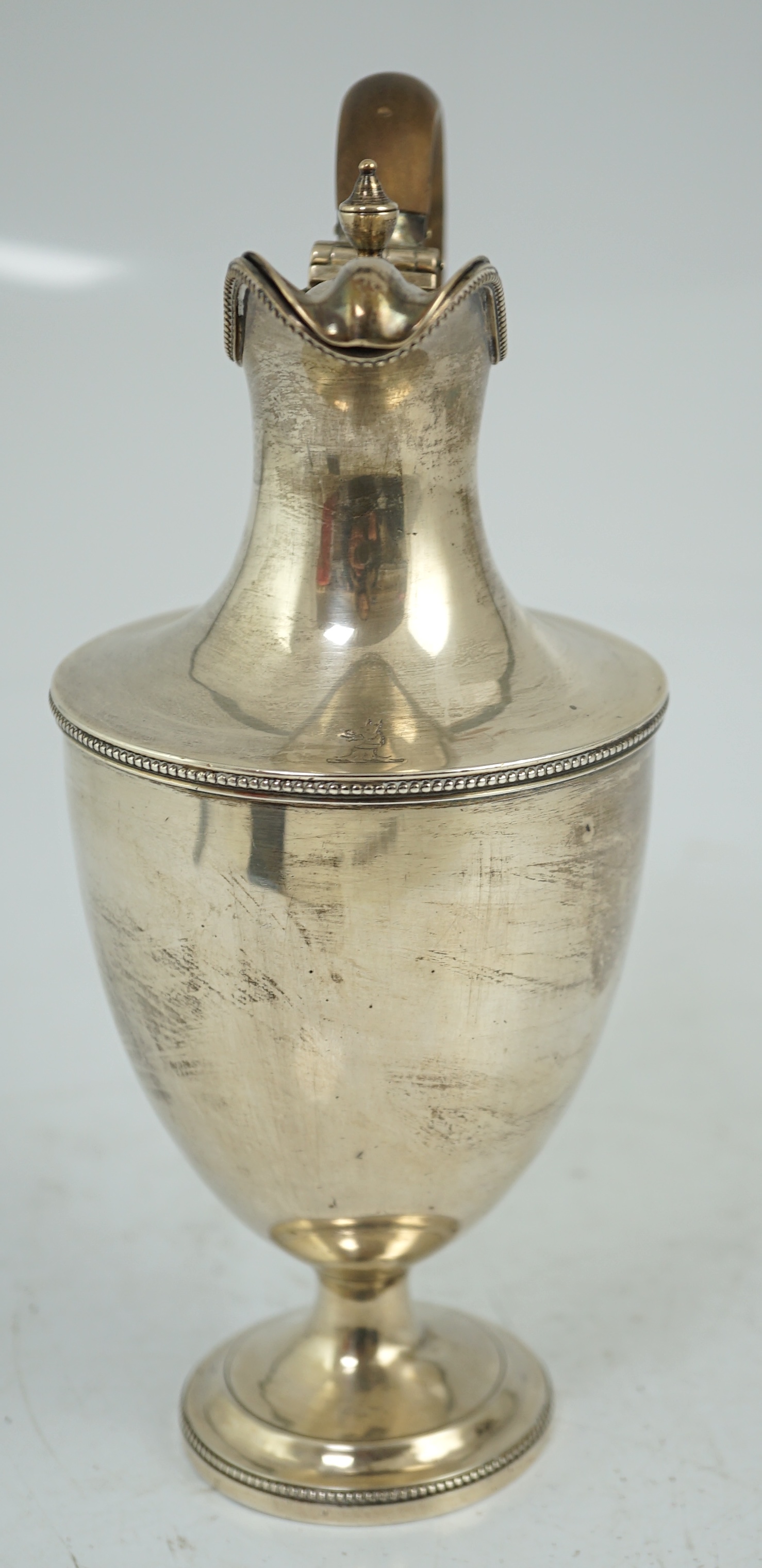 A late Victorian silver pedestal hot water jug, by Jackson & Chase